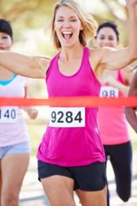 Female Runner Winning Marathon